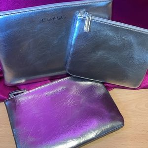 Brand new three-piece, Elizabeth Arden, New York cosmetic cases. All dif size